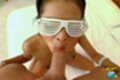 Dar kneeling wearing sunglasses sucking cock