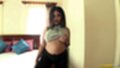 Standing beside bed top raised