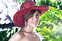 Pretty Lucy Cumme strips zipped dress in hat and poses nude
