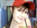 Wearing baseball cap